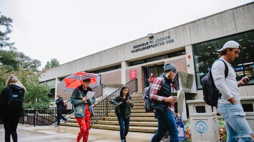 students walking outside of school of business and entrepreneurship